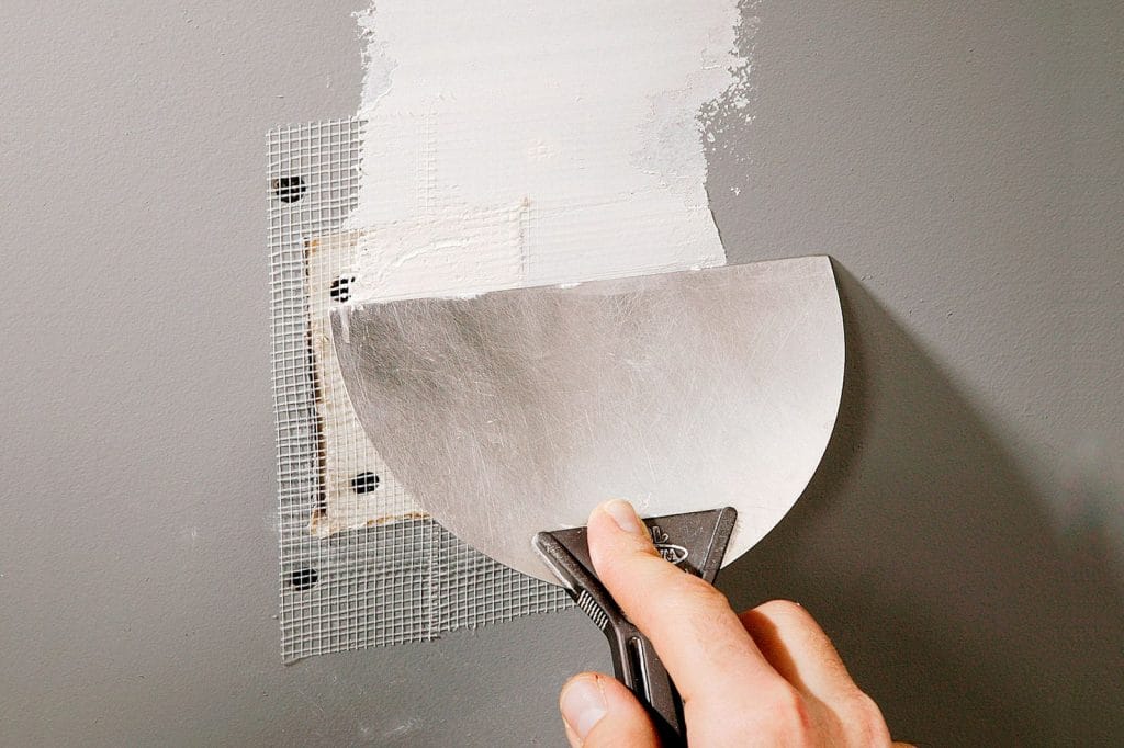how to patch drywall gray wall aadf75af0f5d4ec19704a770bd84efc2